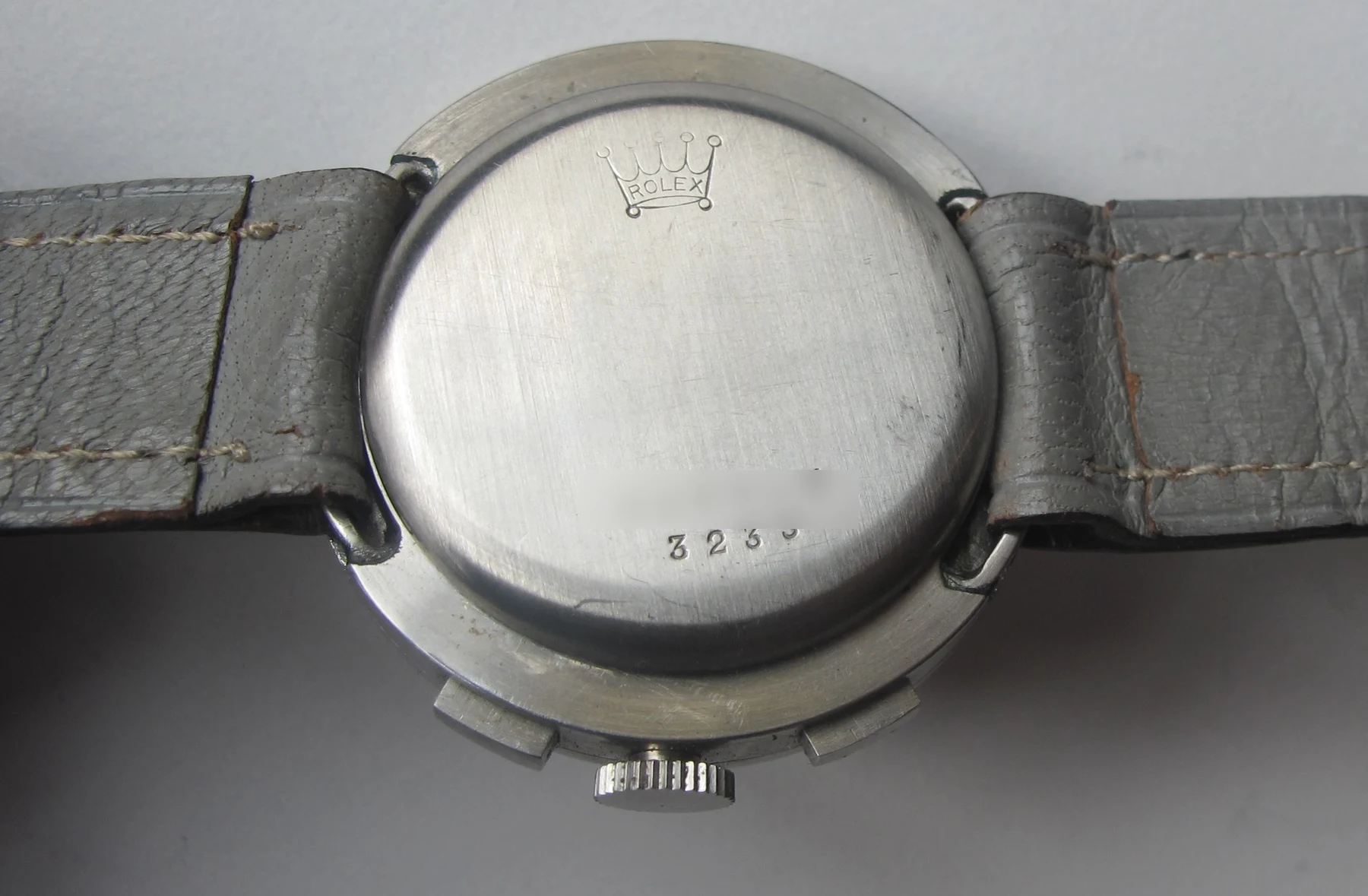 Caseback of the Rolex reference 3233 chronograph with the serial intentionally obscured for privacy