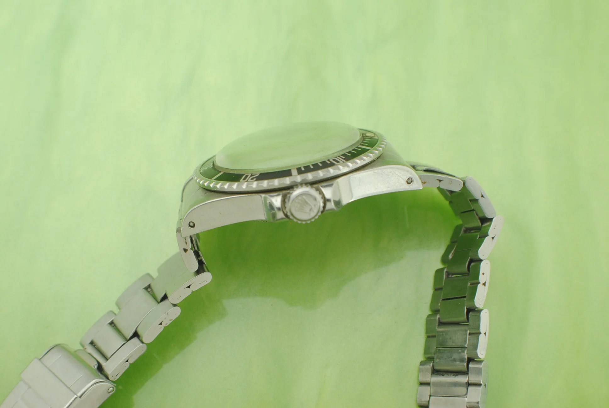 Closer documentary view of the sold Rolex Submariner reference 5512 one-owner watch showing its black dial, luminous plots, steel case, and bracelet
