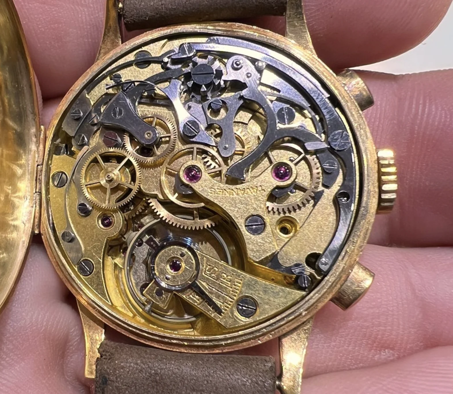 Open movement view of the sold Tavannes chronograph showing the signed Tavannes bridge and chronograph mechanism identified by the owner as Landeron 13