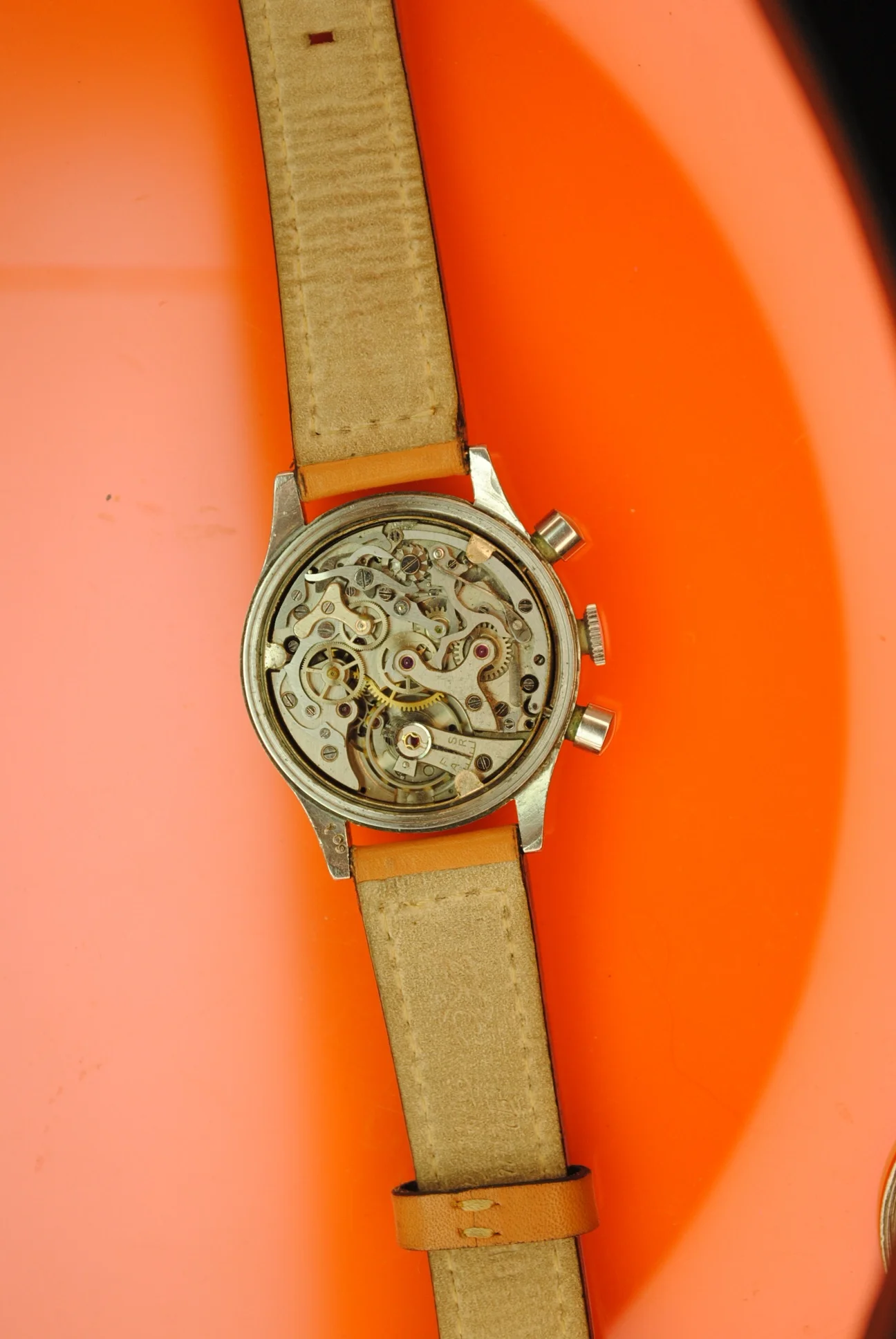 Open case view of the sold Unver chronograph showing the owner-identified Valjoux 72 movement